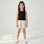 Bangladeshi girl wearing a black ribbed sleeveless top by Trends Kids